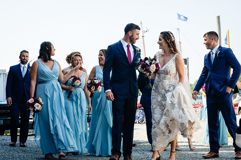 Bridal party enjoying a stroll by the marina.