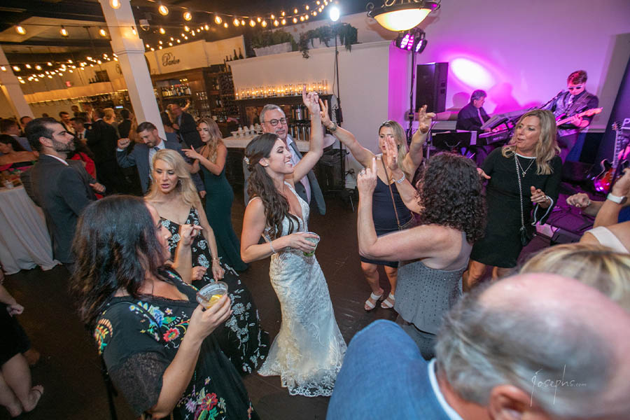 The Bride dancing with her friends on the dance floor to Boston Wedding band, Boston Premier.