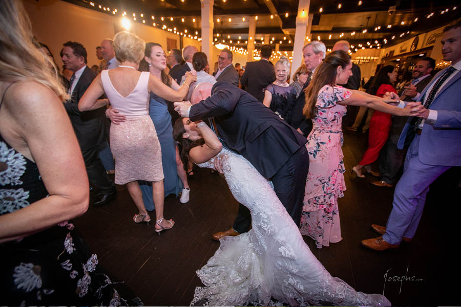 The groom dipping his bride on the dance floor.