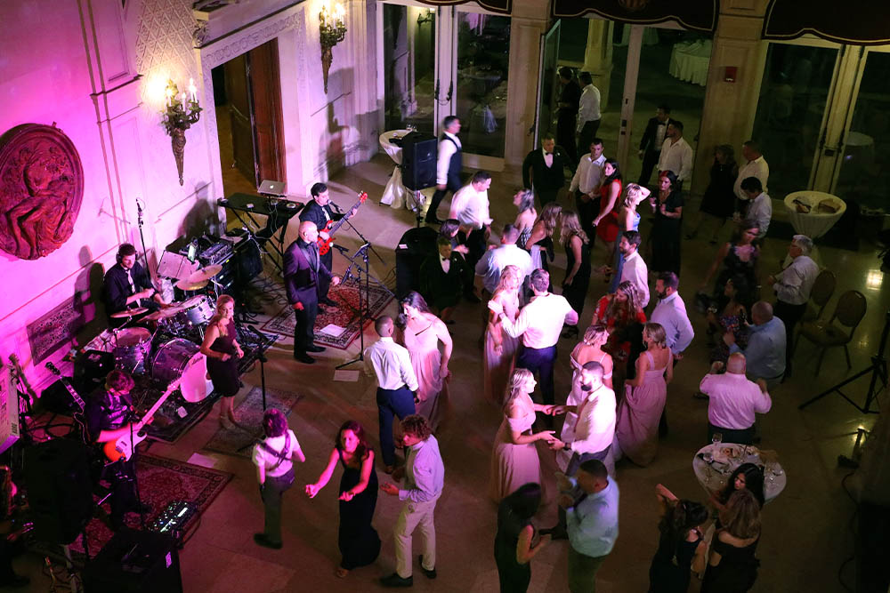 An overhead shot of a packed dance floor as Boston Premier performs