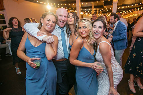 A beautiful wedding with guests dancing at The Spring House to a Rhode Island wedding band