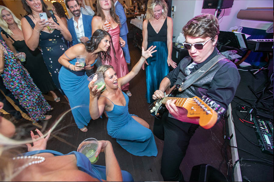 Boston Premier guitarist, Jonathan Cabral, Entertaining guests on the dance floor.