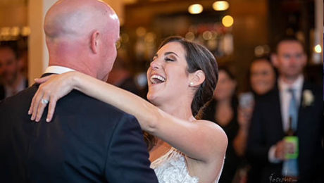 A couple enjoys their first dance while Boston Premier Band performed their special song.