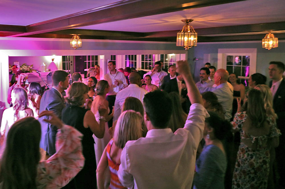Wedding guests dancing as Boston Premier performs.
