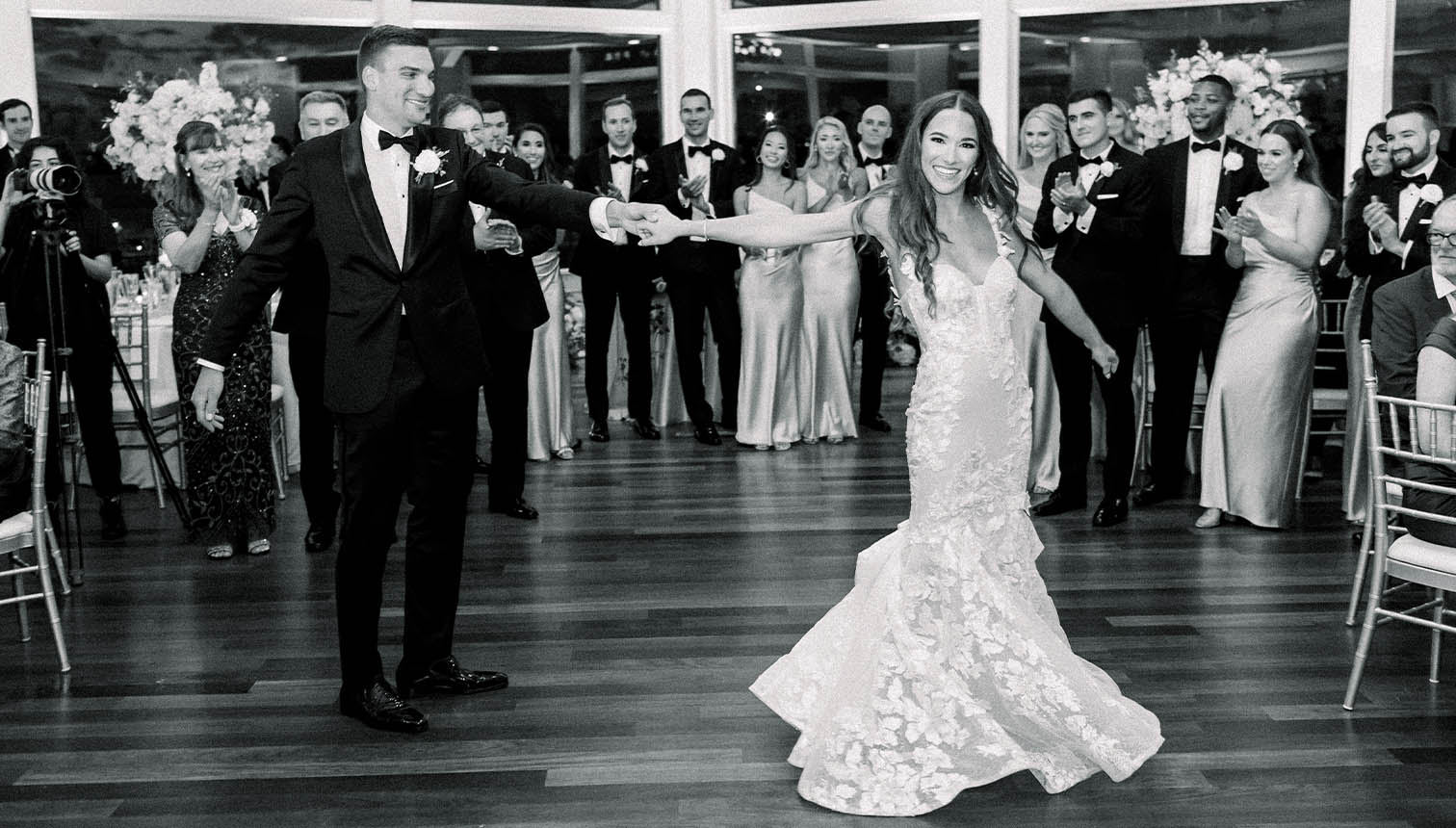 A wedding couple enjoy their first dance as Boston Premier plays their favorite song.