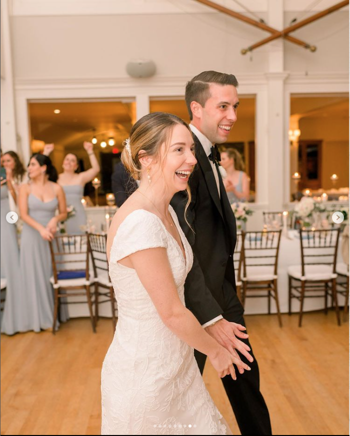 The Bride and groom make their entrance into the ballroom.