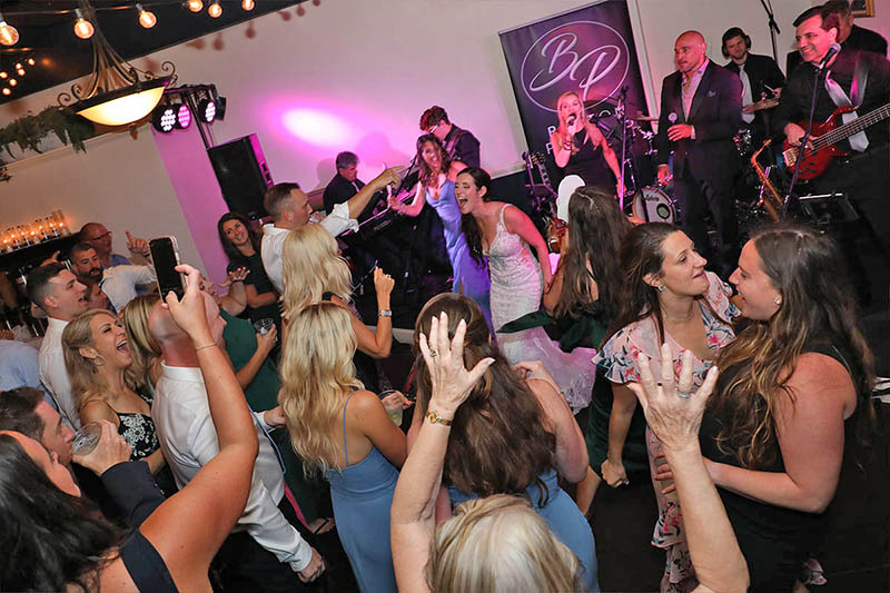 The wedding crowd dancing wildly to the music of Boston Premier