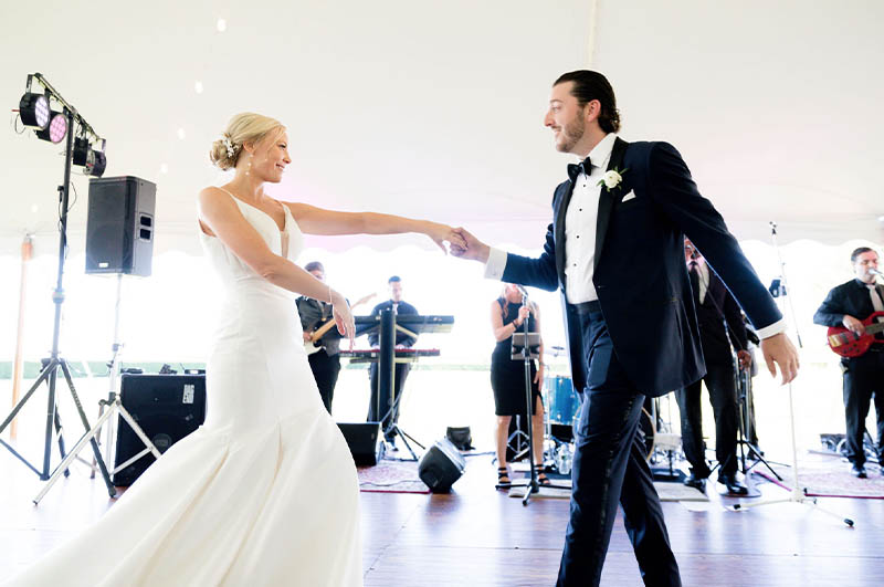 Laura and Ryan dance as Boston Premier performs their first dance song