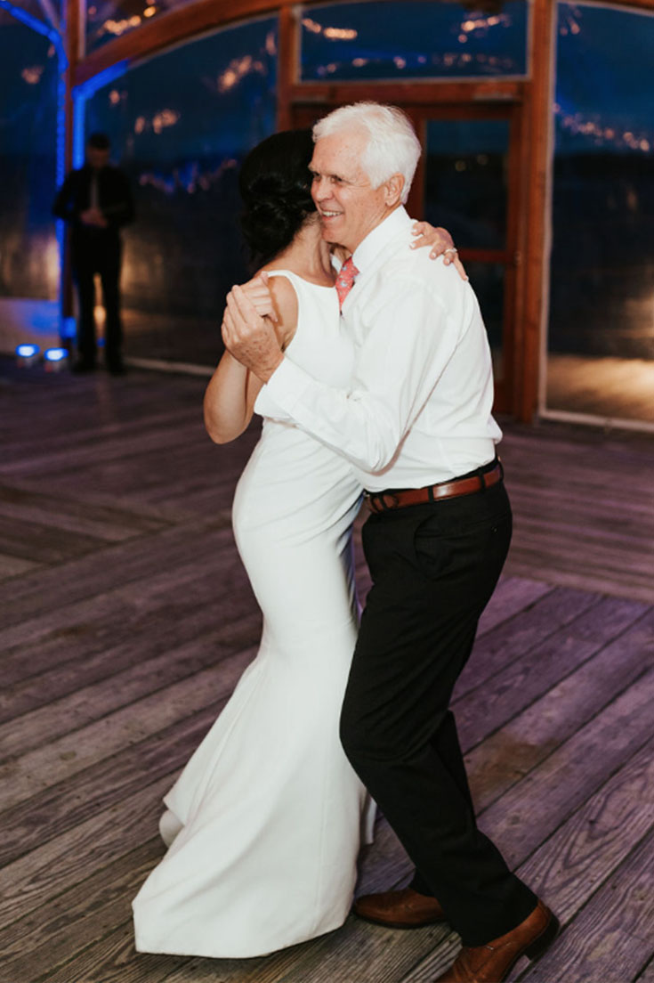 The bride dancing with her father.