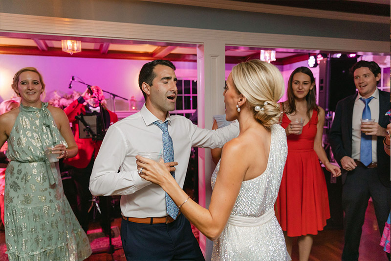 The BRIDE AND GROOM DANCING TO THE MUSIC OF A BOSTON WEDDING BAND