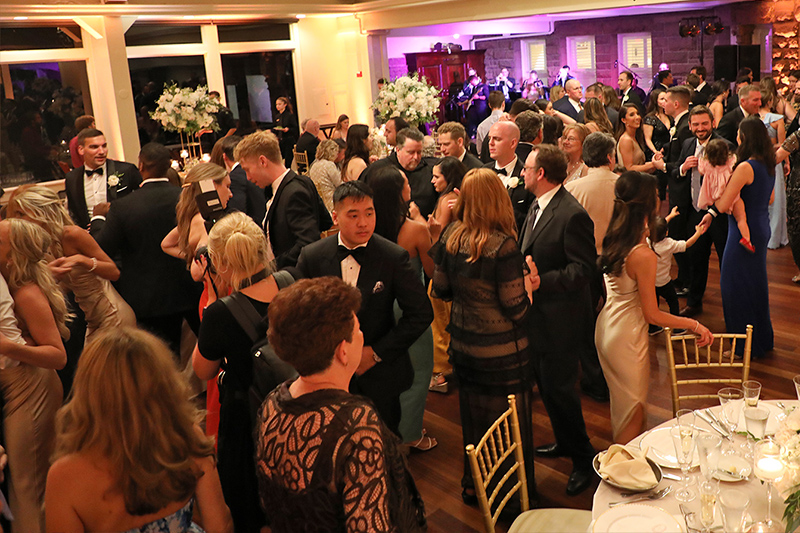 A packed dance floor while Boston Premier performs live at the Newport wedding.