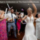 A bride dancing with friendsto the music of Boston Premier