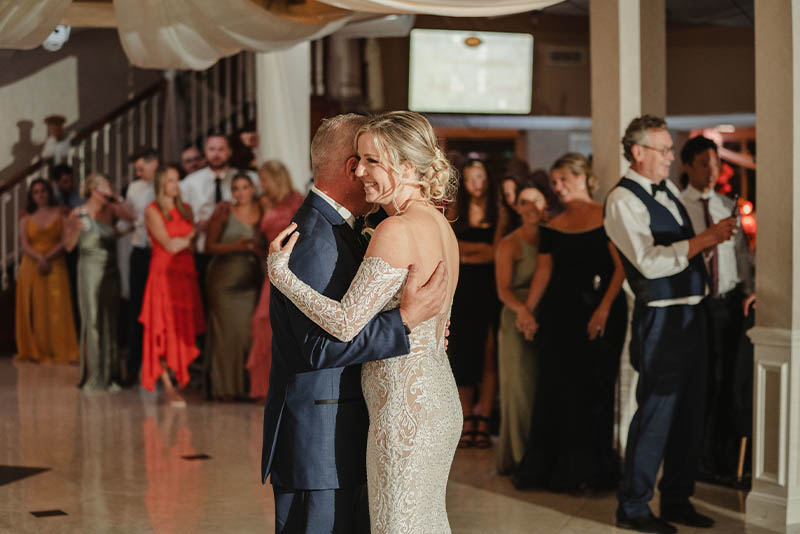 The Bride dancing with her father while everyone watches