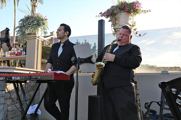 The Boston Premier Band Jazz Duo perform for the cocktail hour.