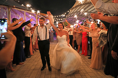 Alexis and Ryan leave their reception in grand style.