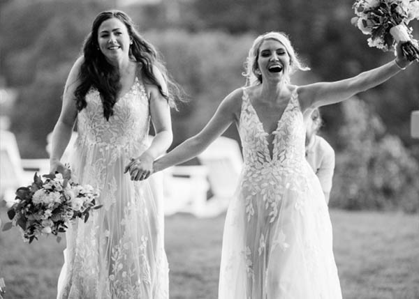 The grand enterance of the 2 brides make their first appearance at their reception