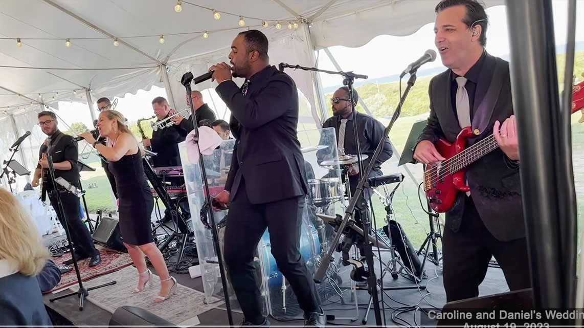 Boston Premier performing on stage at a Block Island Wedding