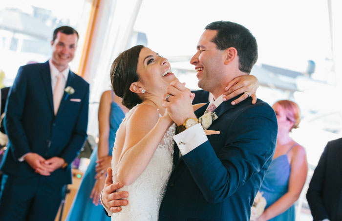 A bride and groom enjoying their first dance.